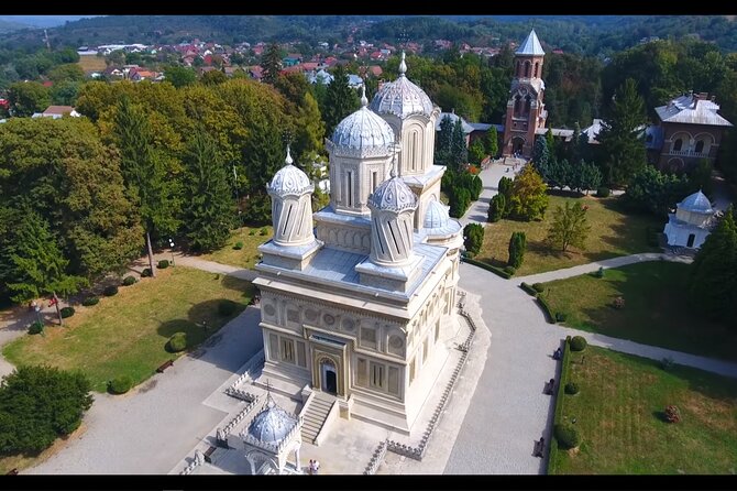 8 Days Private Romania Tour from Bucharest - Barsana’s tall wooden monastery, Tihuța Pass driving, and Ciocănești’s color riot