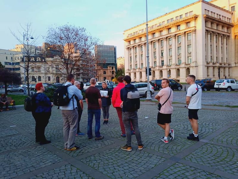 Bucharest: Communism and History Guided City Walking Tour - Caru’ cu bere and the Revolution Square ending that puts dates in context
