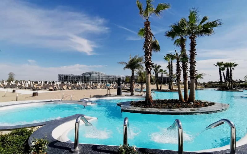 Bucharest: Therme București Entry Ticket with Transportation - Galaxy Zone: water slides, wave pool, and family-friendly wellness