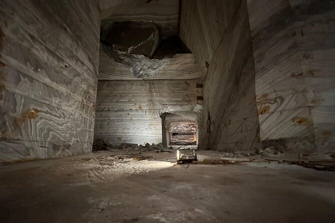 Salt Mine and Muddy Volcanoes - A Private Tour from Bucharest - Unirea Salt Mine: 208 meters down and 54 meters up