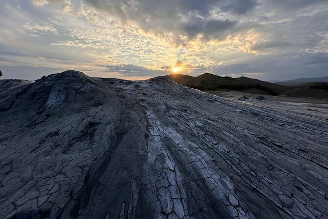 Salt Mine and Muddy Volcanoes - A Private Tour from Bucharest - Vulcanii Noroiosi: the bubbling mud volcanoes you have to see to believe