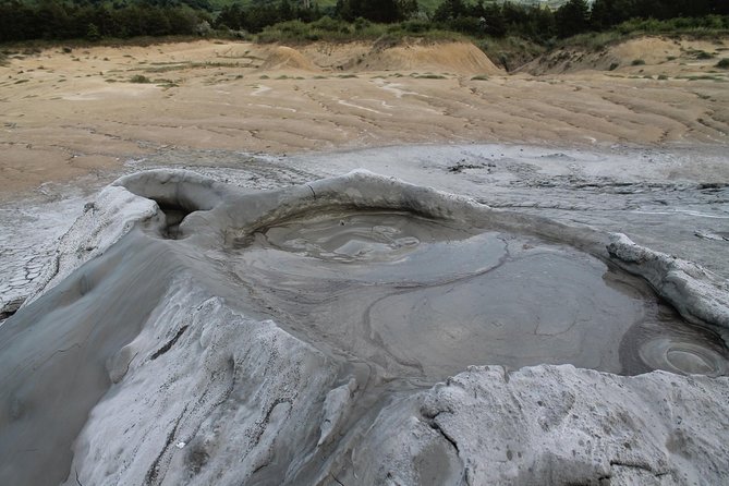 The Salt Mines, The Winery, The Muddy Volcanoes! The Fixers Private Tour - Vulcanii Noroiosi Mud Volcanoes: The Lunar-Looking Terrain Stop